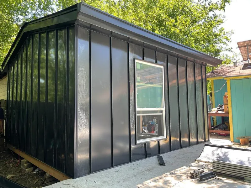 Black standing seam metal wall panels for Roof Inspection in Summit